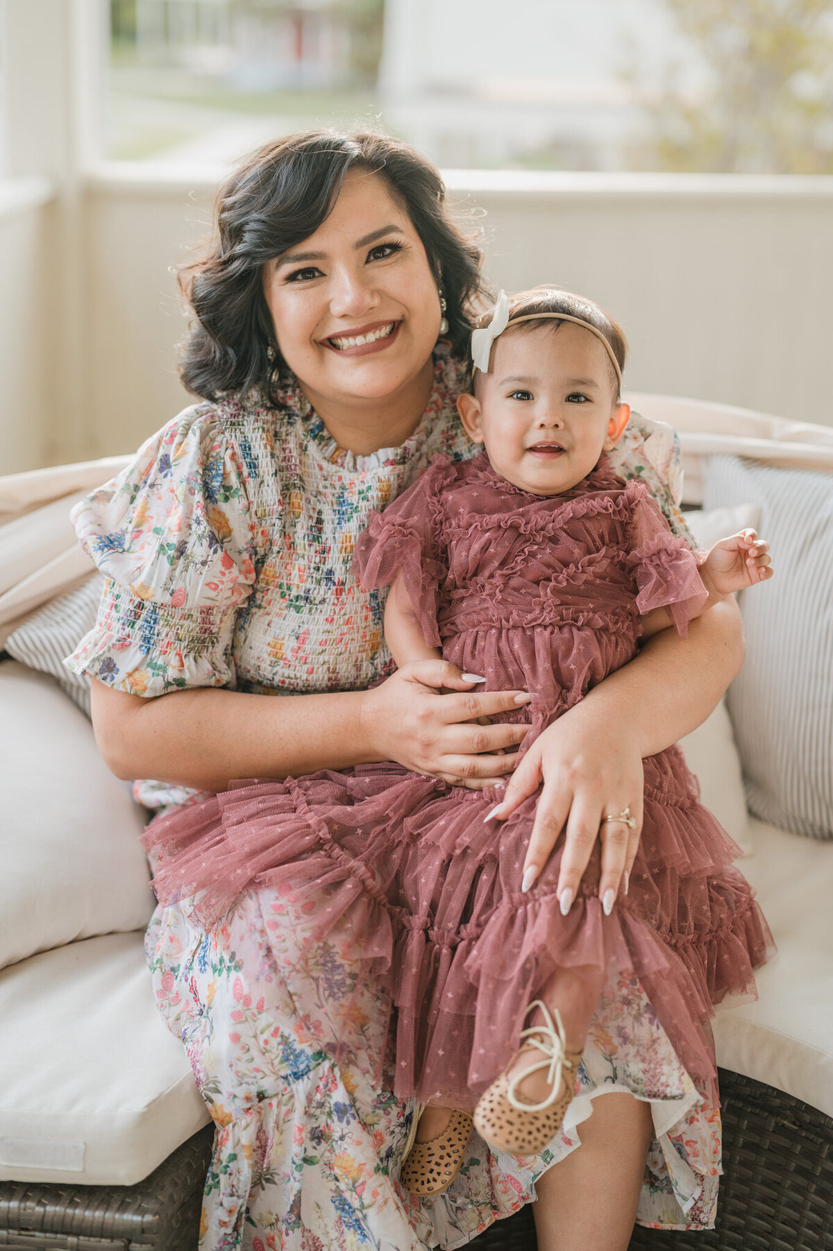 Beautiful picture of a mom and little girl in dresses during a San Antonio family photo session.