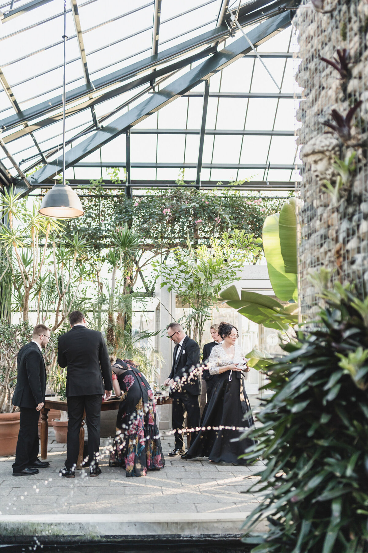 An elegant black tie garden wedding at Planterra Conservatory in West Bloomfield Michigan provided by top rated Metro Detroit wedding photographer Kari Dawson25