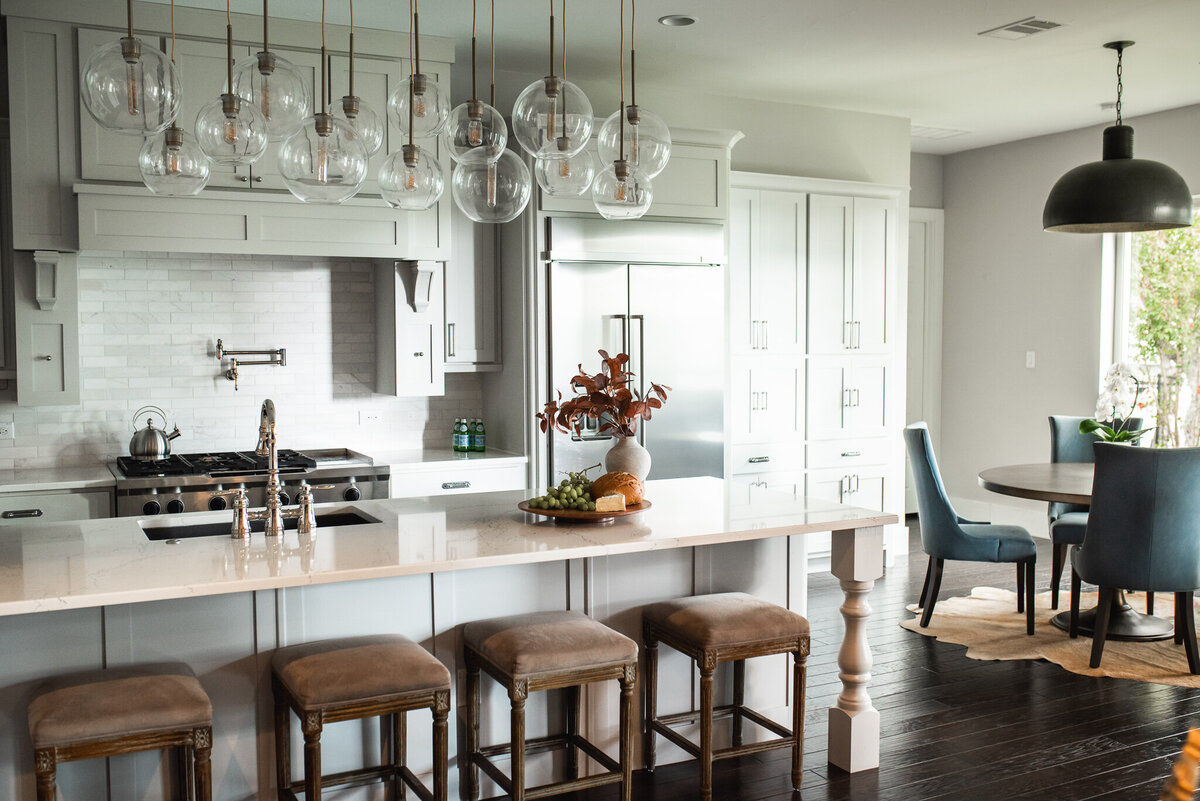 dusti j design green kitchen and brown stools