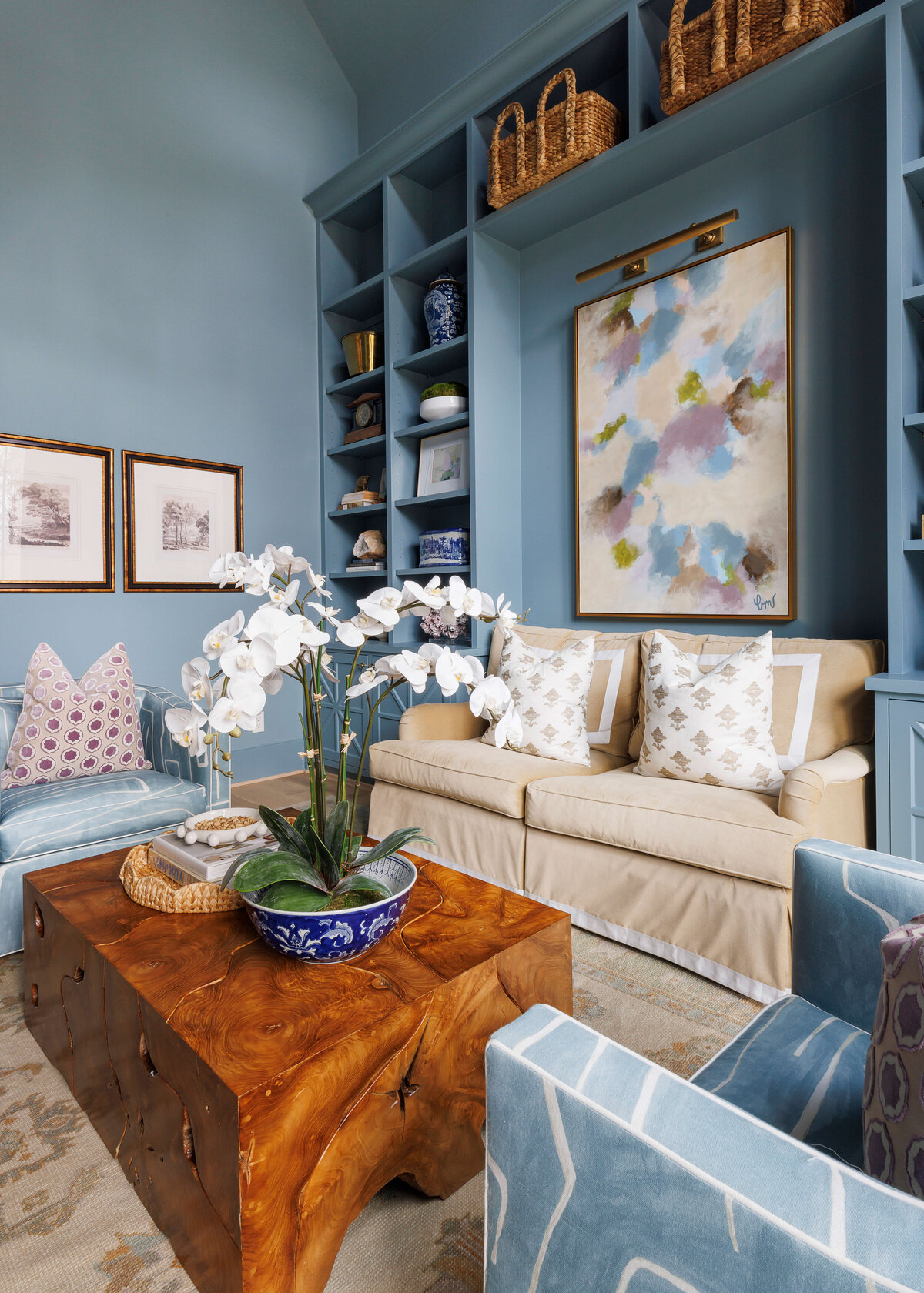 oyster creek studios missouri city new build tan sofa with wooden coffee table with artwork in living room