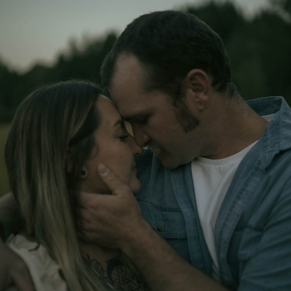 An adventurous vintage-style couple hikes through scenic Washington landscapes, capturing an engagement session filled with exploration and love.