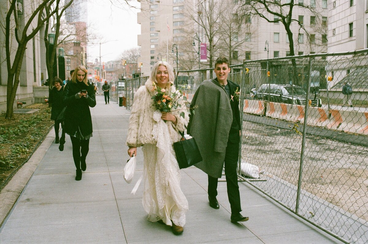 NYC Manhattan City Hall Wedding Elopement Walking Down Street LGBT Couple