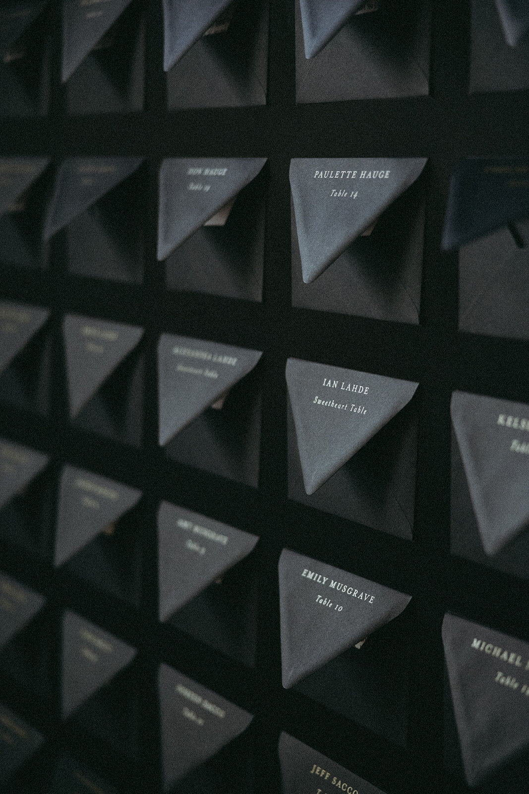 Gold Ink Printed Black Escort Card Envelopes for Moody Mountain Castle Wedding at The Fairmont Banff Springs
