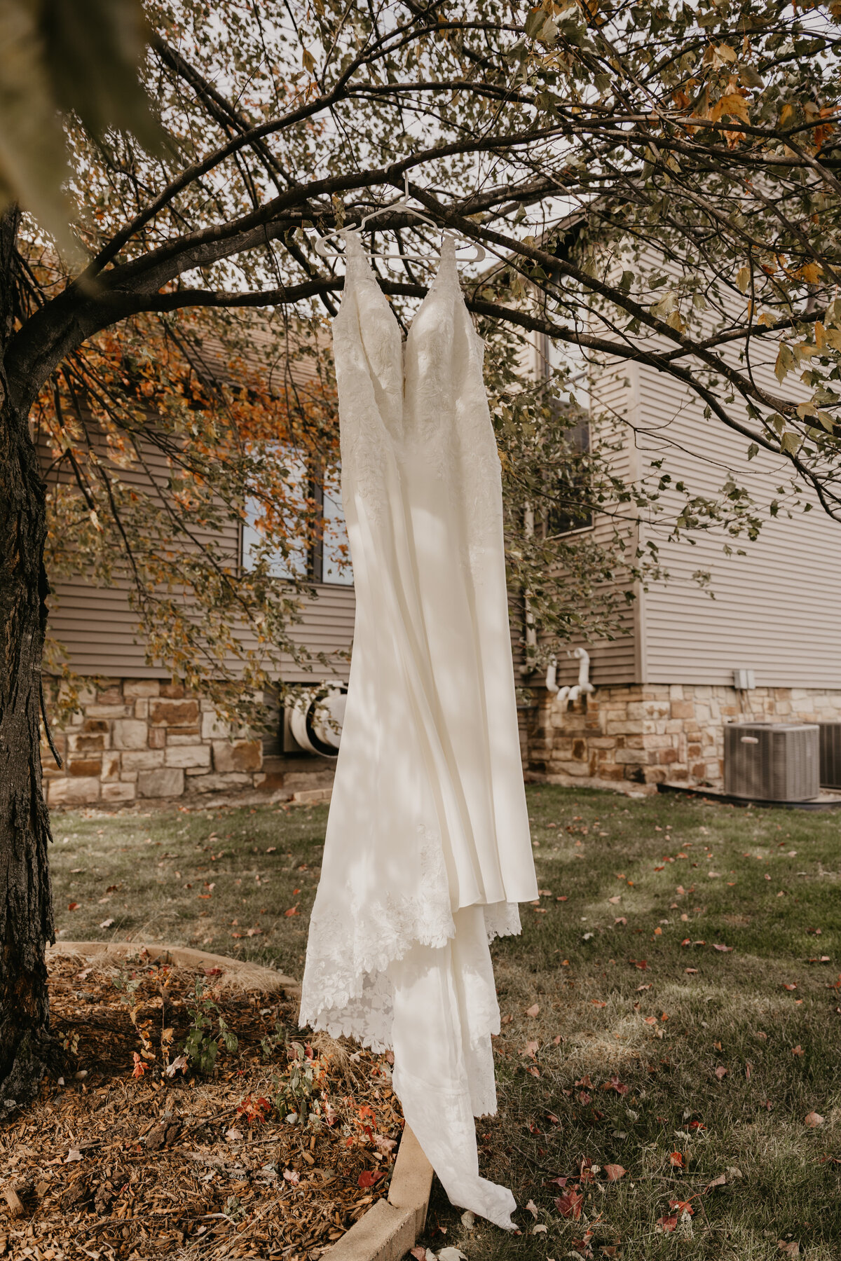 Modern Boho wedding dress photographed outside of Church.