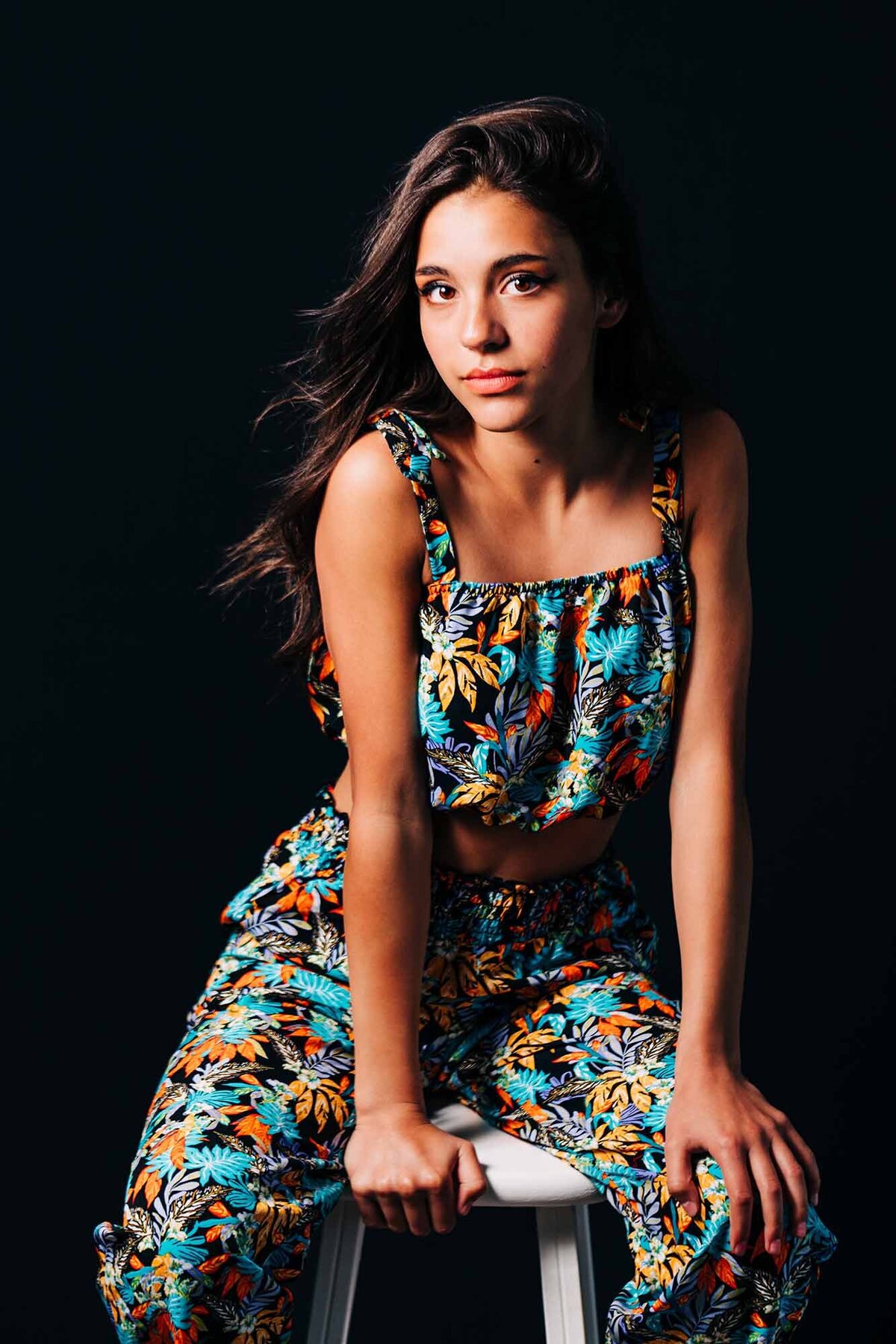 Studio portrait Montana model in floral jumpsuit