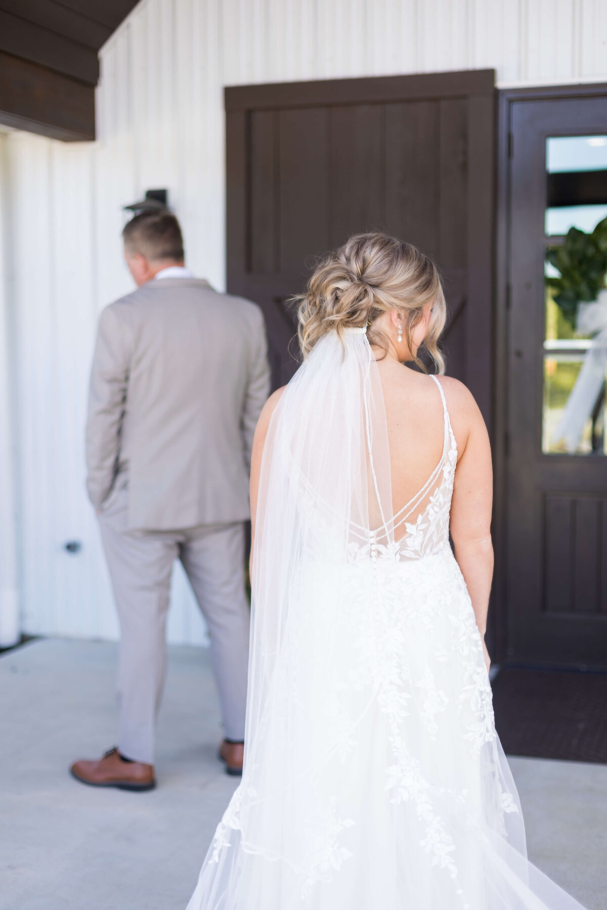 Bride and groom first look at  The Barn at White Oaks, Murray, Kentucky