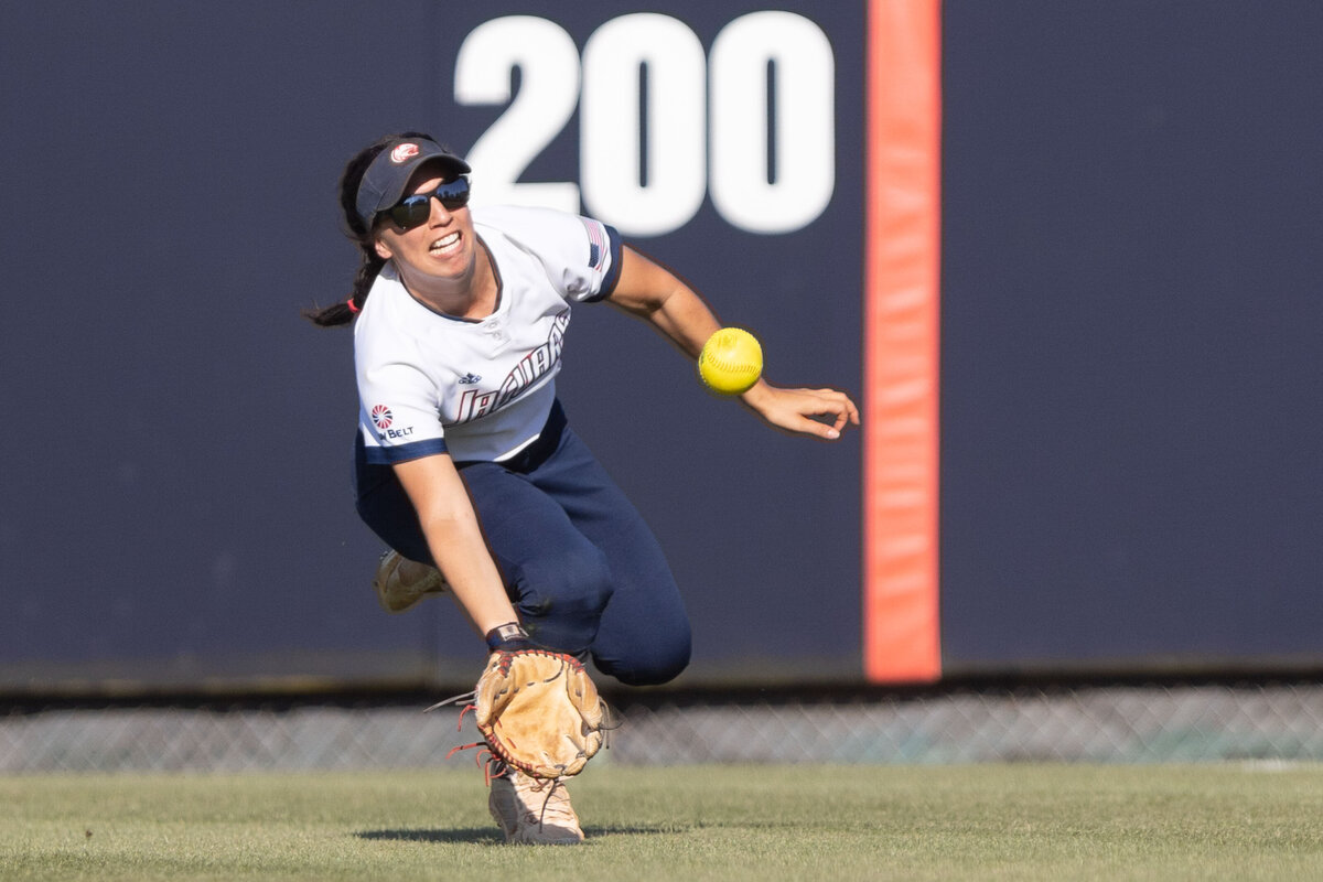 Victoria Ortiz of Mobile, Alabama catches a fly ball.