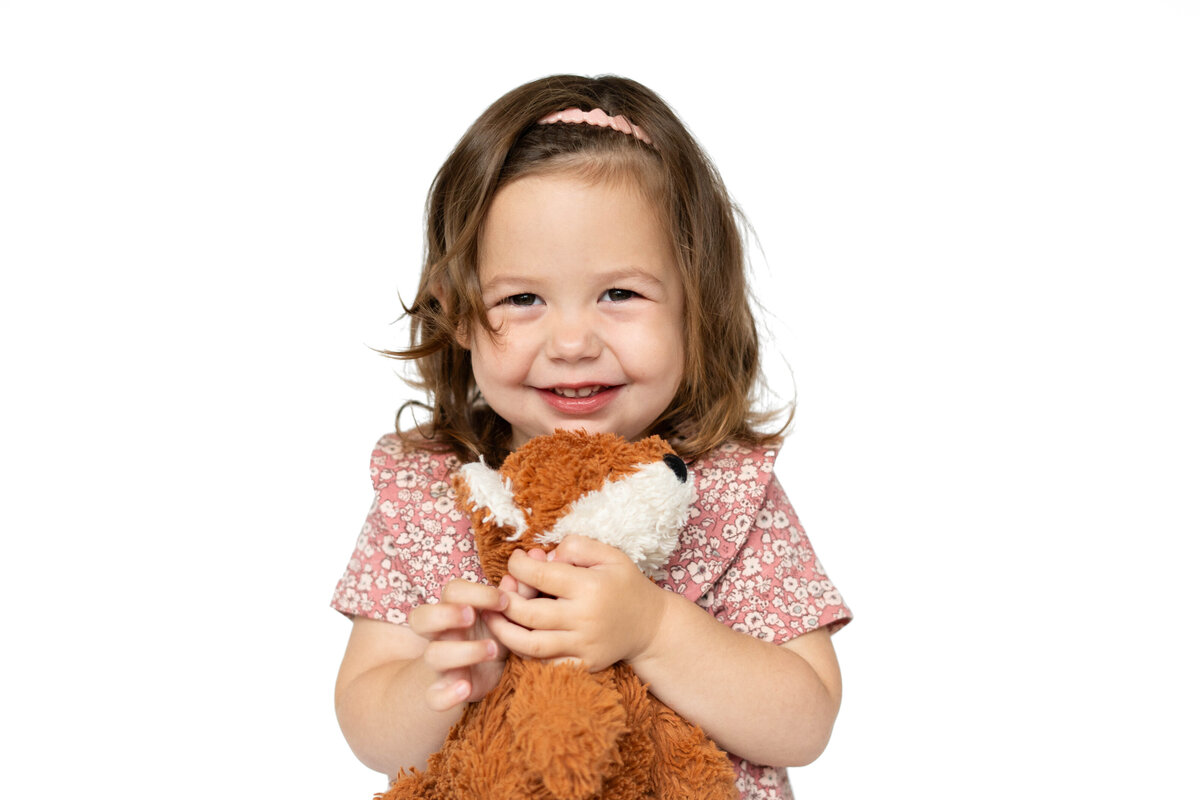 Preschool photo Boston - little girl holding stuffed animal