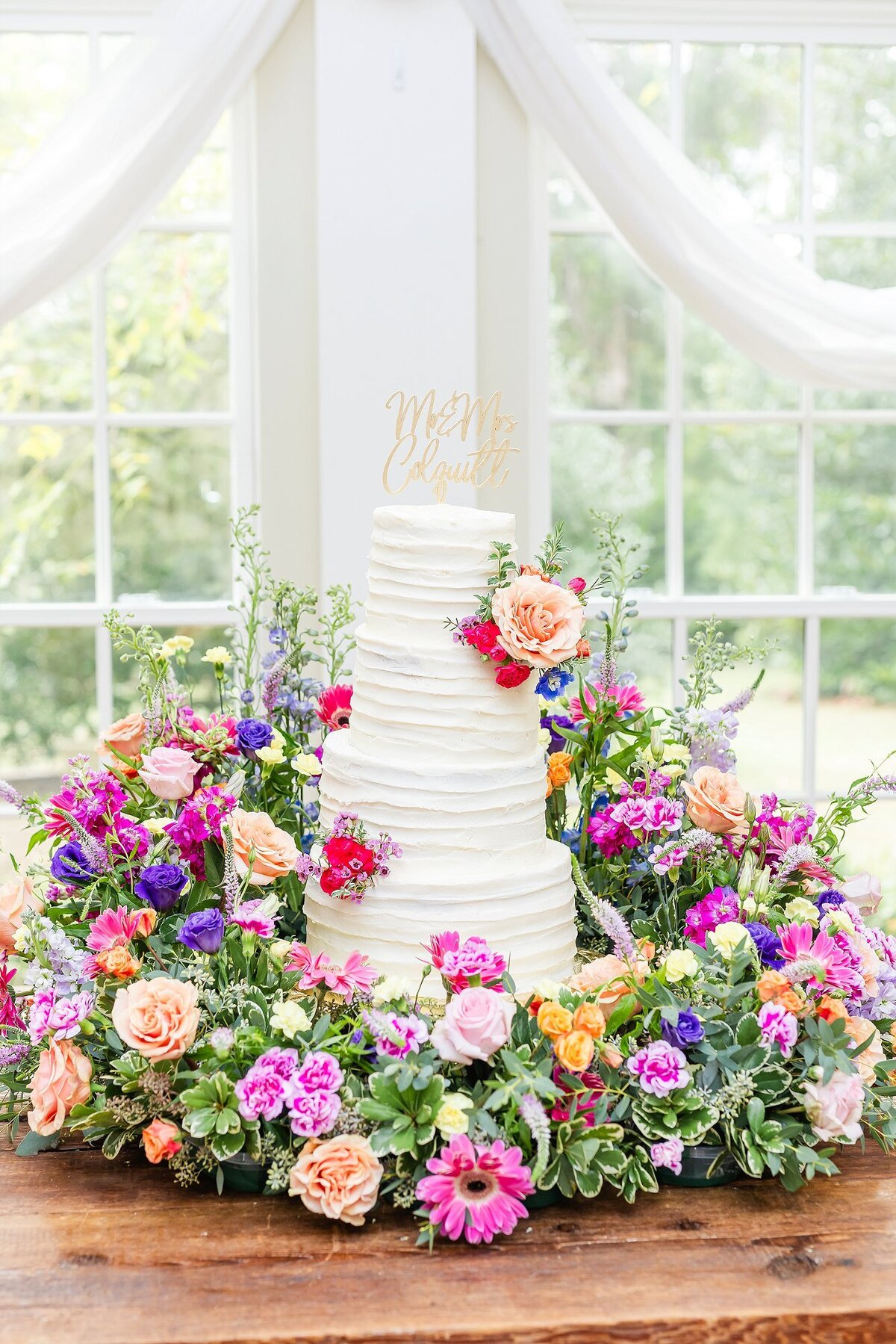 Wedding cake with floral garden  | Elms of Coosada Wedding Photographer 