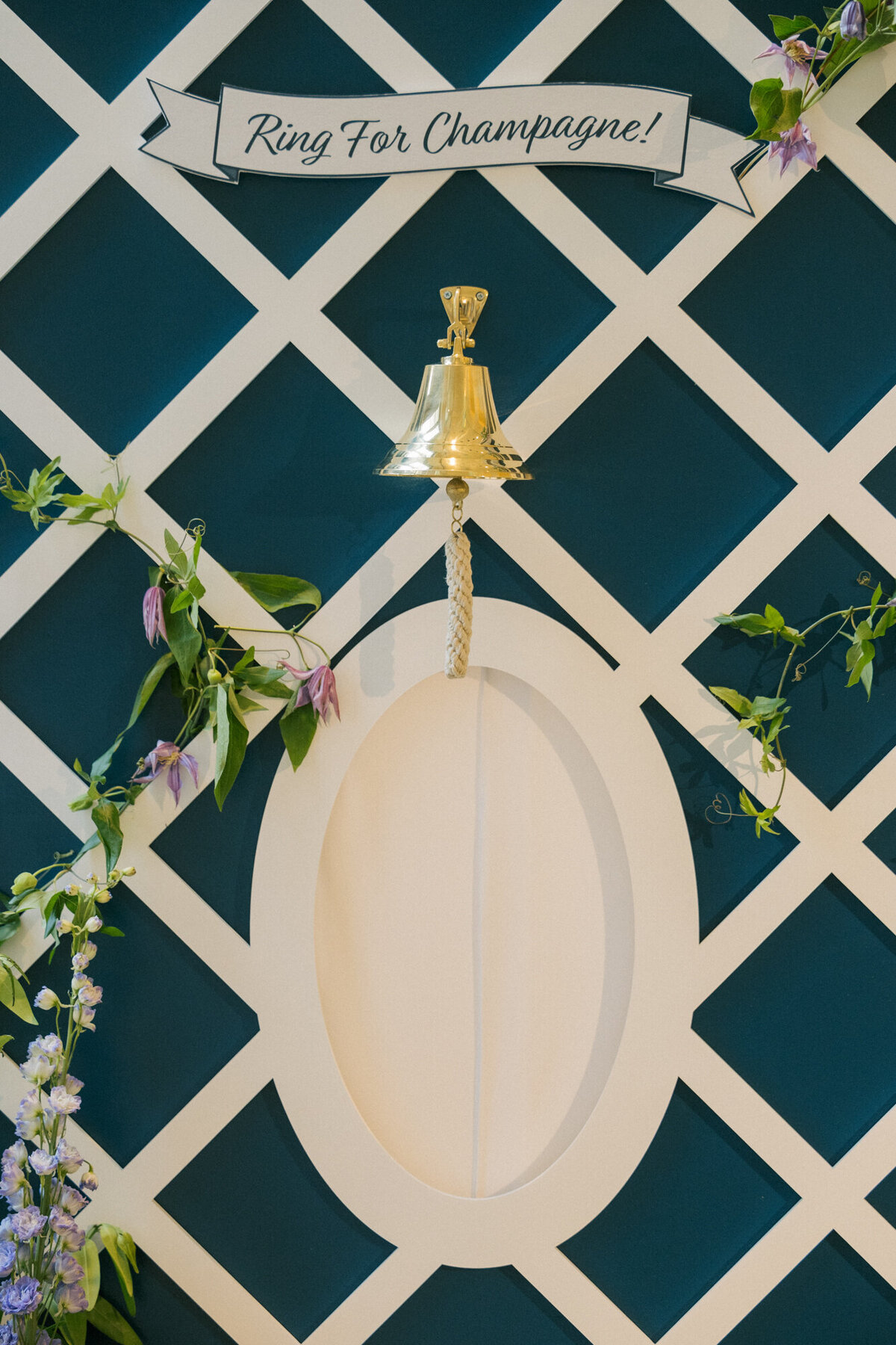 A chic and playful “Press for Champagne” wedding sign at an elegant reception.