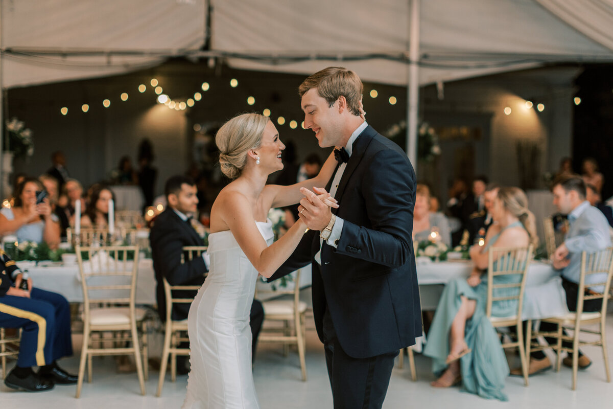 A couple shares their first dance as husband and wife.