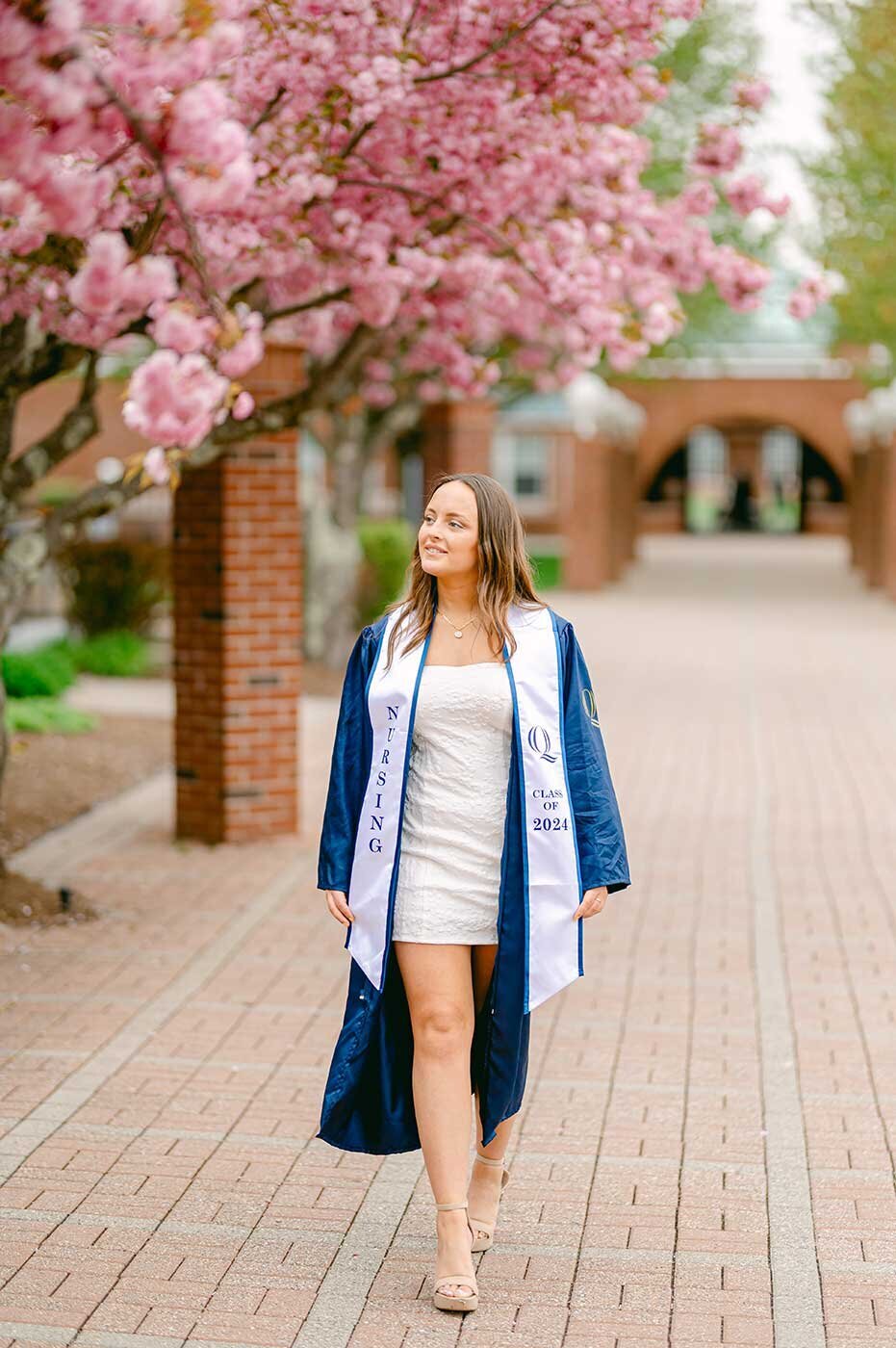 Quinnipiac University cherry blosoms and student