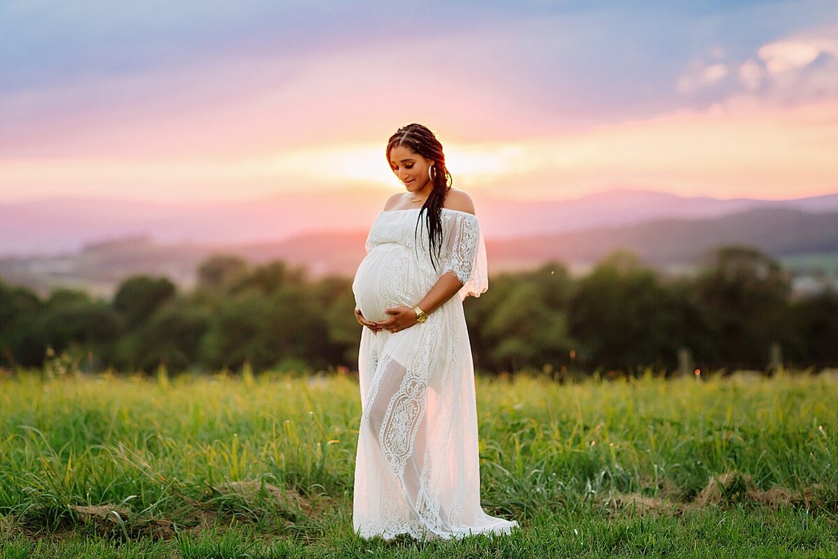 Maternity session in white dress with sunset in Harrisonburg, VA