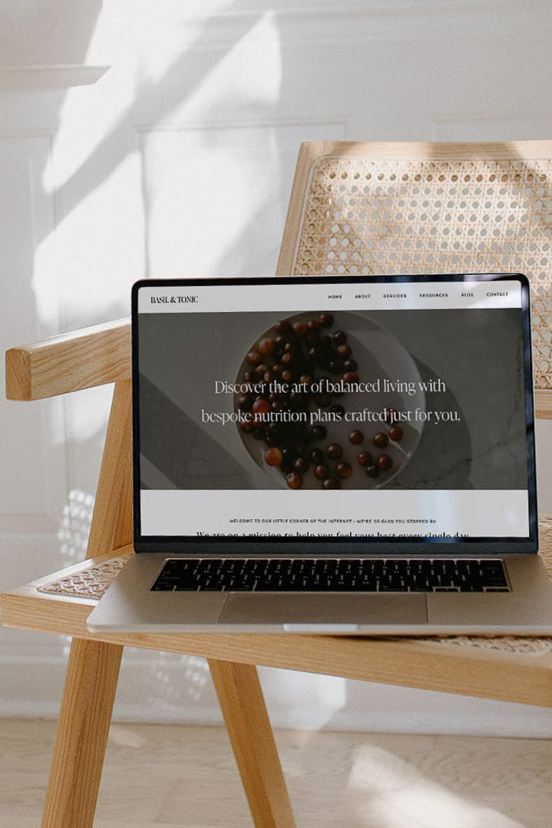 MacBook mockup showcasing a custom Showit website design by VERVE & COLOR