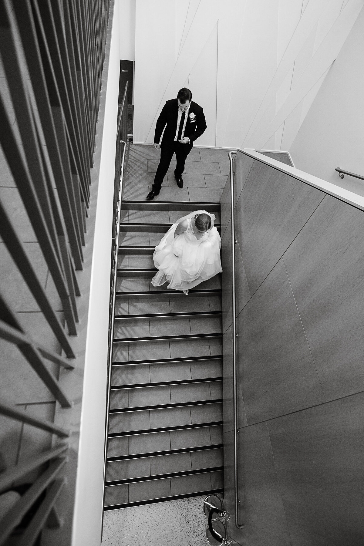 loveland-colorado-wedding-photography-bride-and-groom-on-staircase