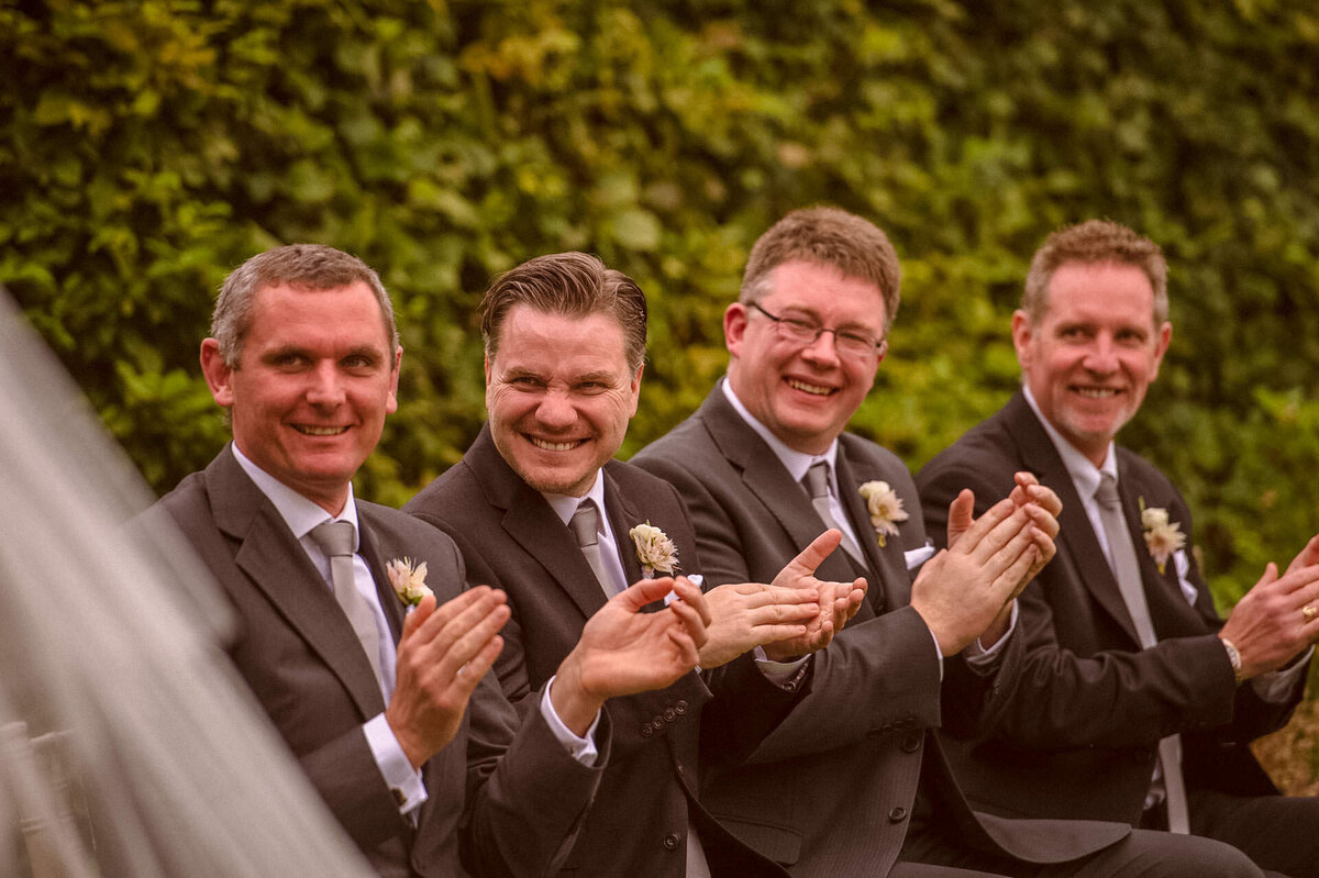 99 groomsmen-clapping-hard-at-kerry-wedding