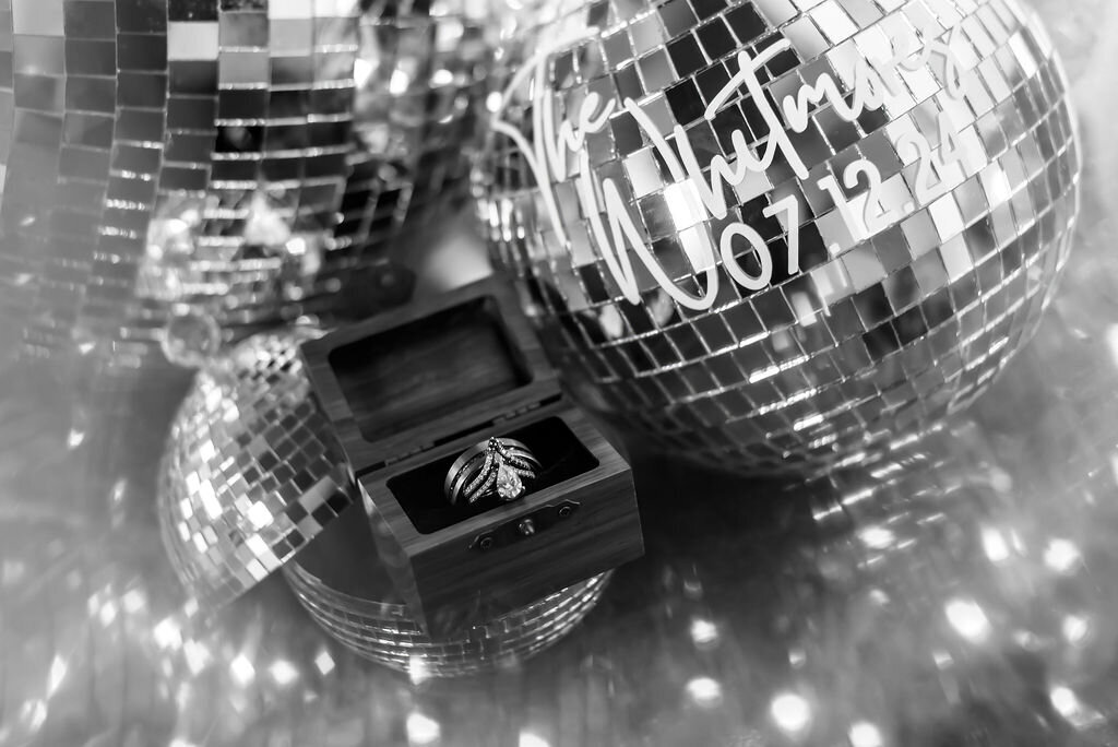 Vesper-and-Vow-Bemidji-Minnesota-wedding-and-elopement-photographer-coordinator-planner-dark-moody-disco-rings-black-and-white
