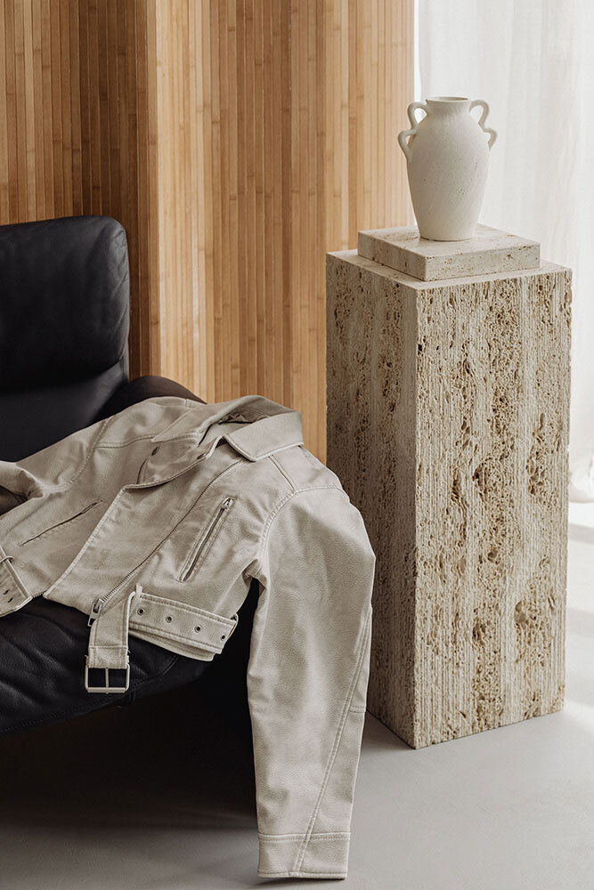 kaboompics_travertine-furniture-sunglasses-white-leather-jacket-35881