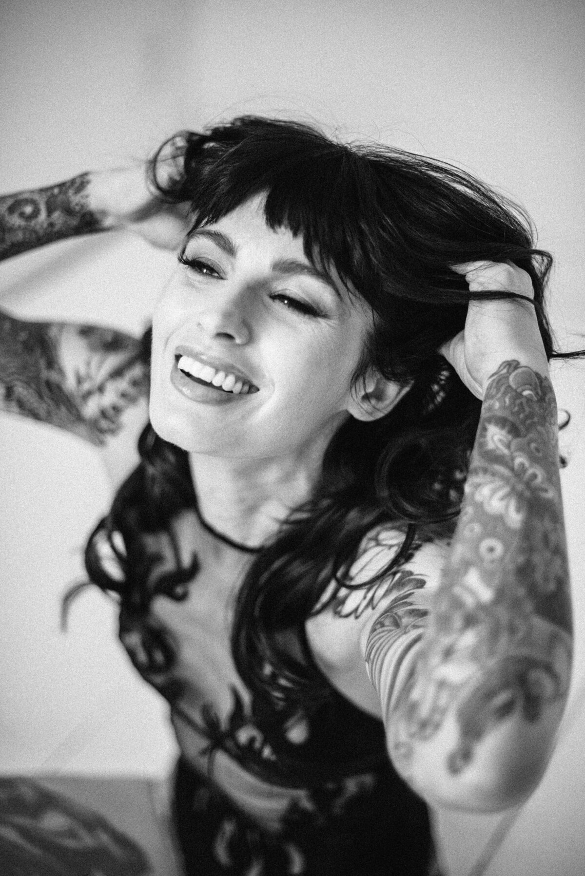 Luxury boudoir portrait session capturing bold and confident poses.