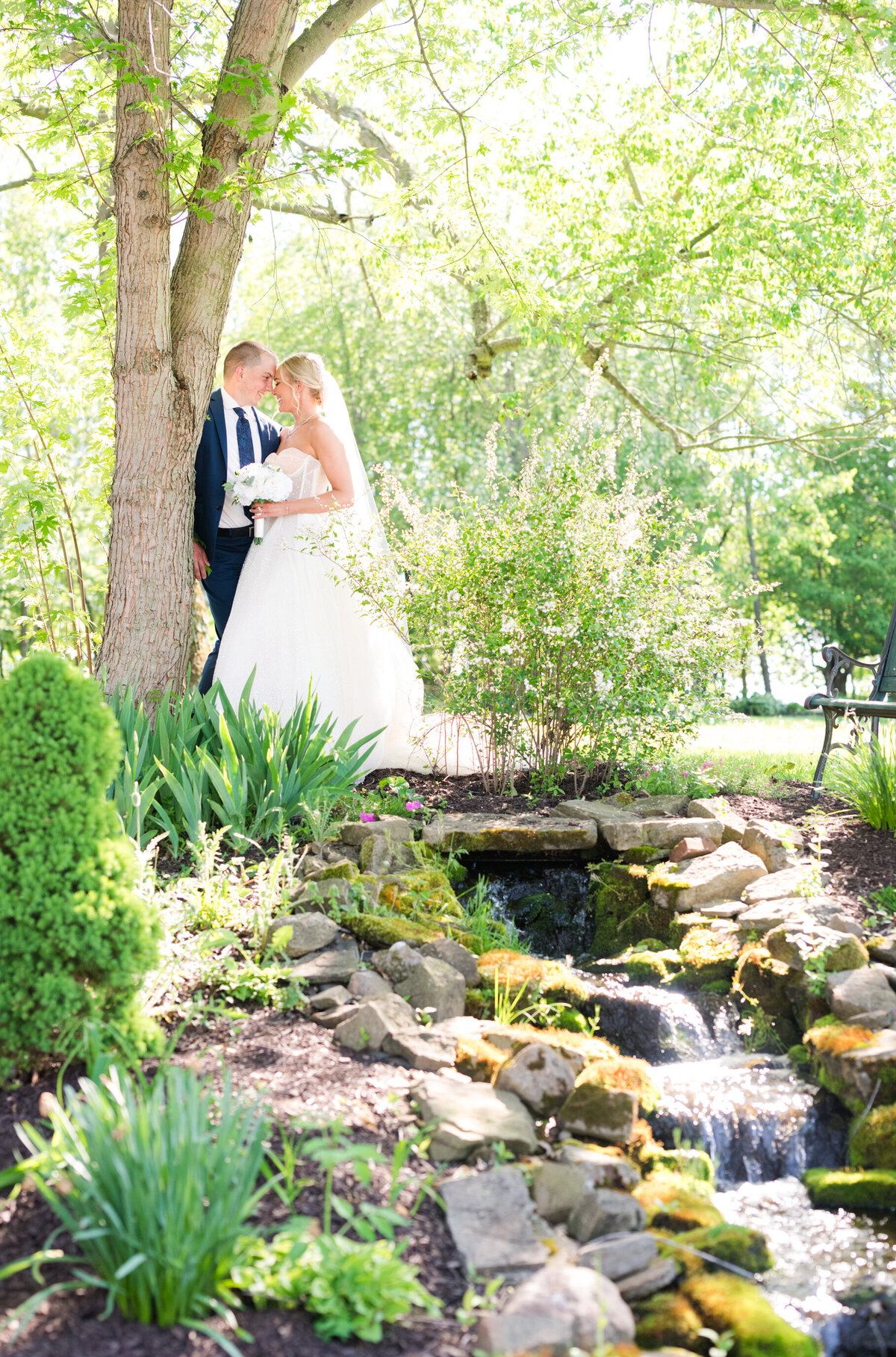 bride and groom outside in garden