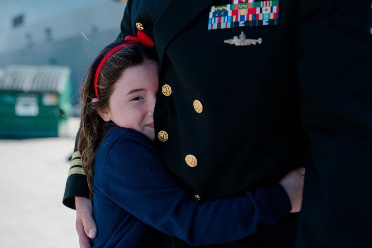 military-child-hug-navy-homecoming