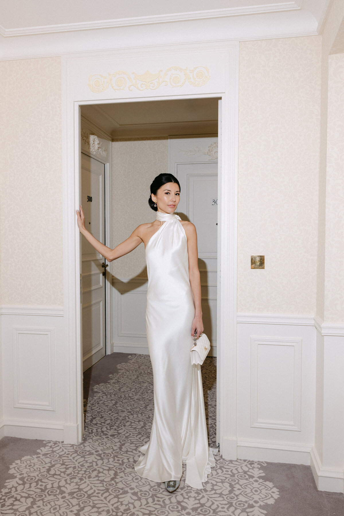 Elegant Bride posing in a suite thof The Maybourne Riviera at Roquebrune-Cap-Martin, France