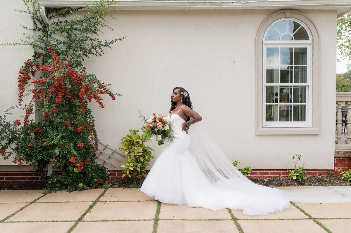 bride alone with florals