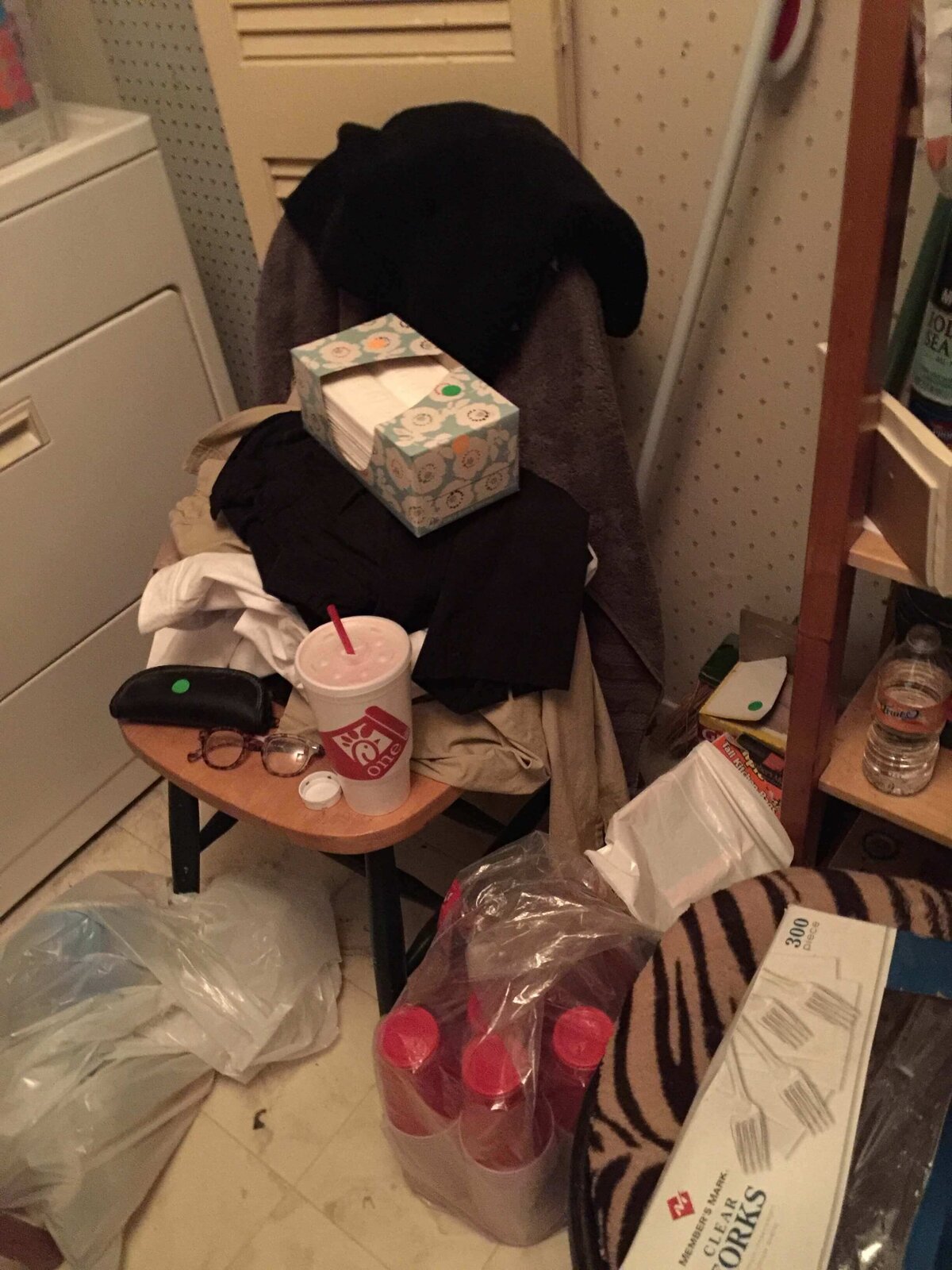 Disorganized messy laundry room