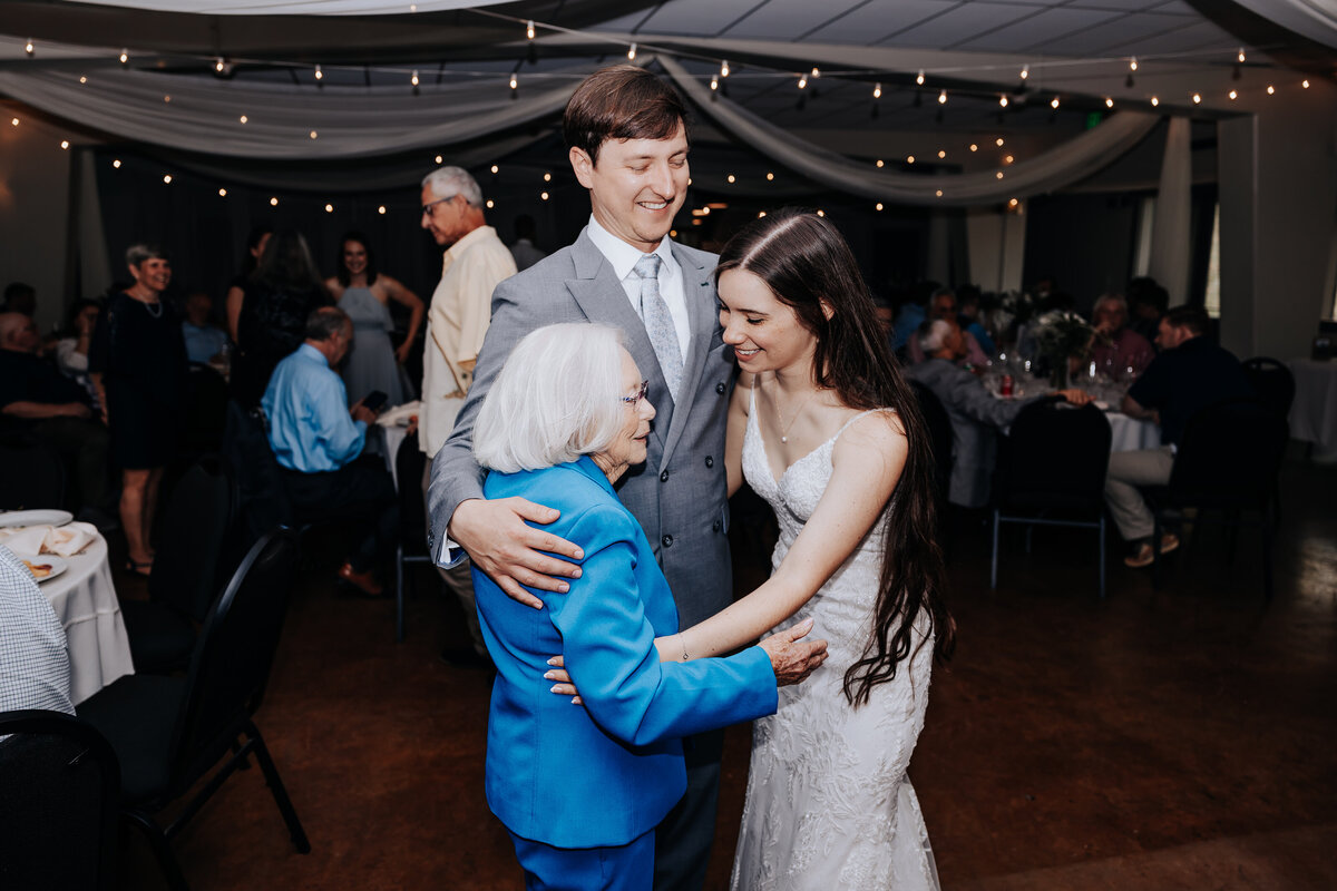 Nashville wedding photographer captures bride and groom dancing with grandma