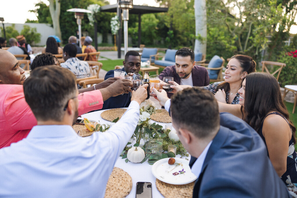 Wedding guest cheers at backyard weddings