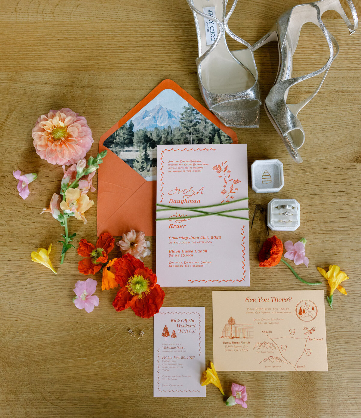 Coral and peach wedding invitation with calligraphy custom details, florals and berries representing full service design and calligraphy by Life in Letters.
