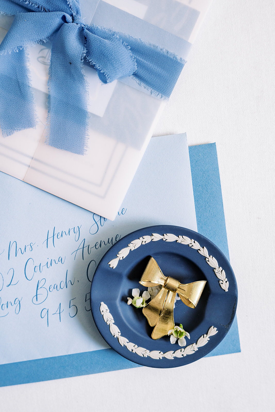 full-blue-suite-flatlay-modern-design-gold-details
