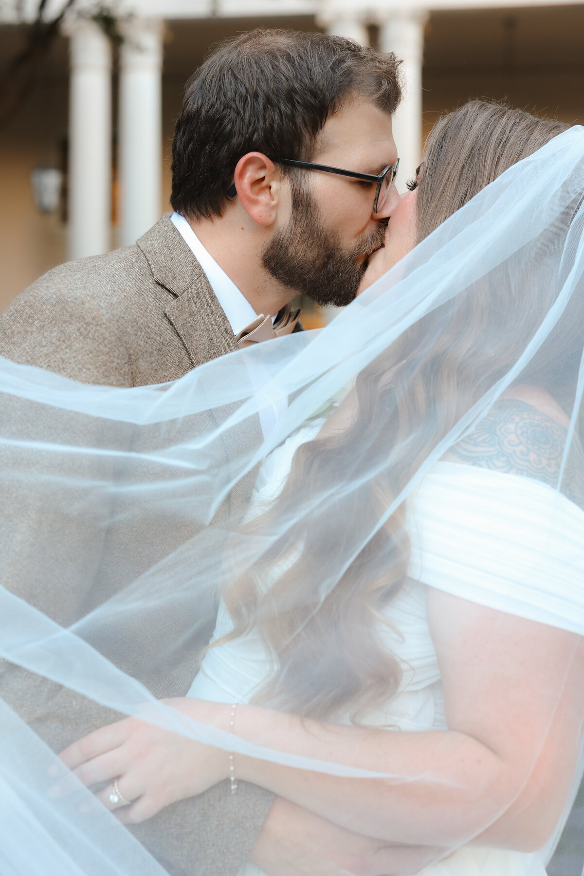 Bride and groom in golden hour light for their wedding portraits.