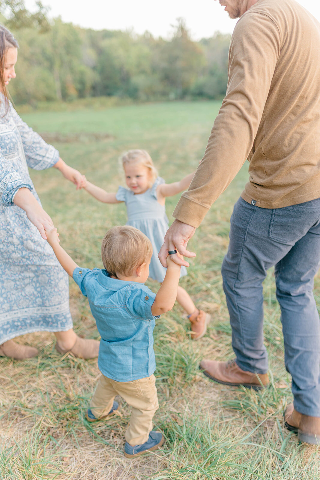 Family playing ring around the rosy
