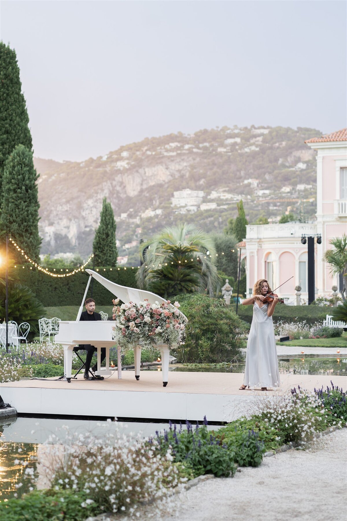 Elegant outdoor cocktail with live orchestra