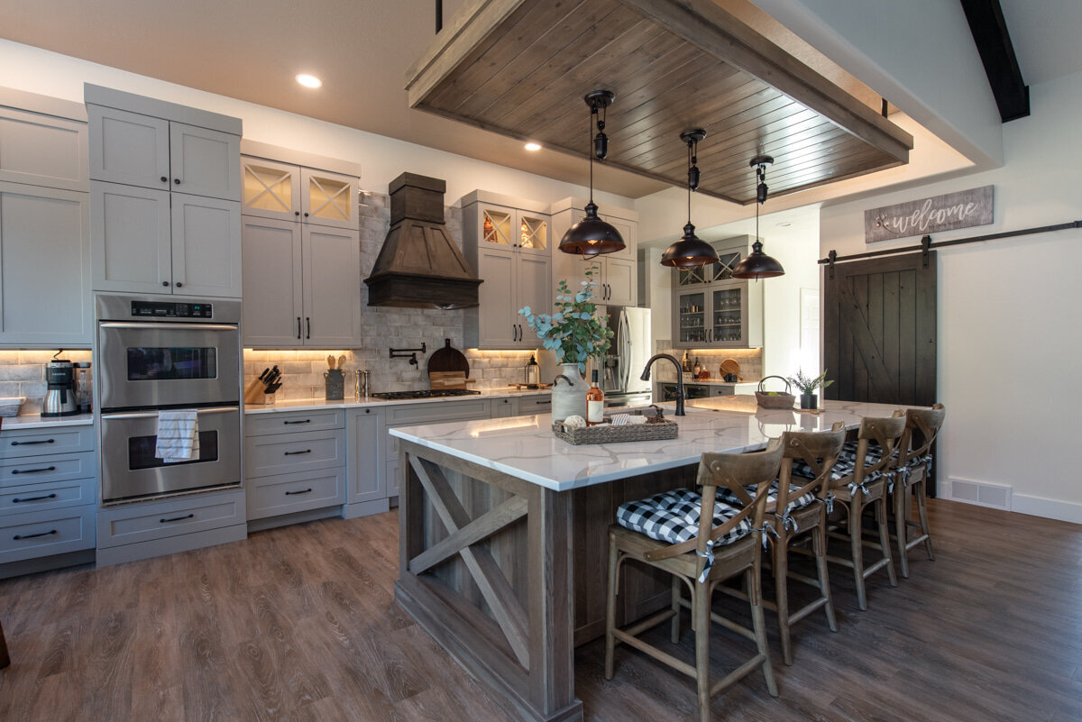 Farmhouse kitchen of Colbert Farmhouse renovation project designed by Hayden Idaho interior design firm Sarro Design.