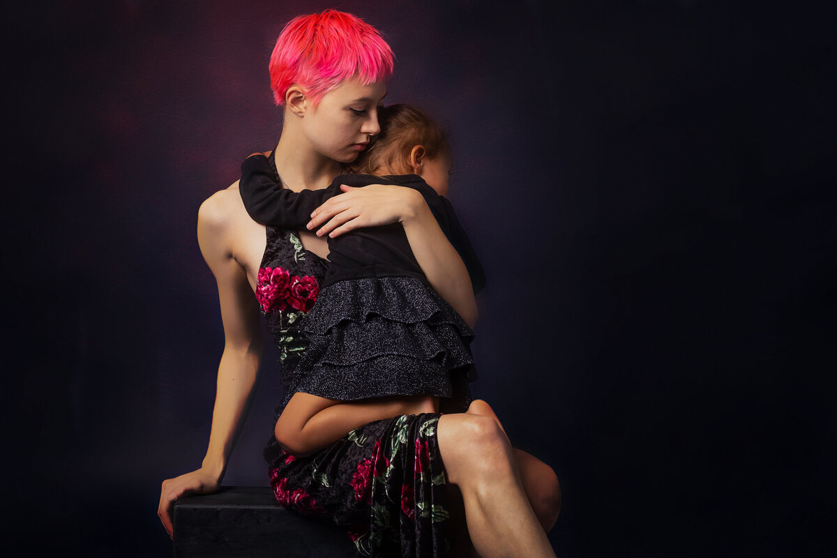 Professional family portrait sessions in a Kansas City studio setting