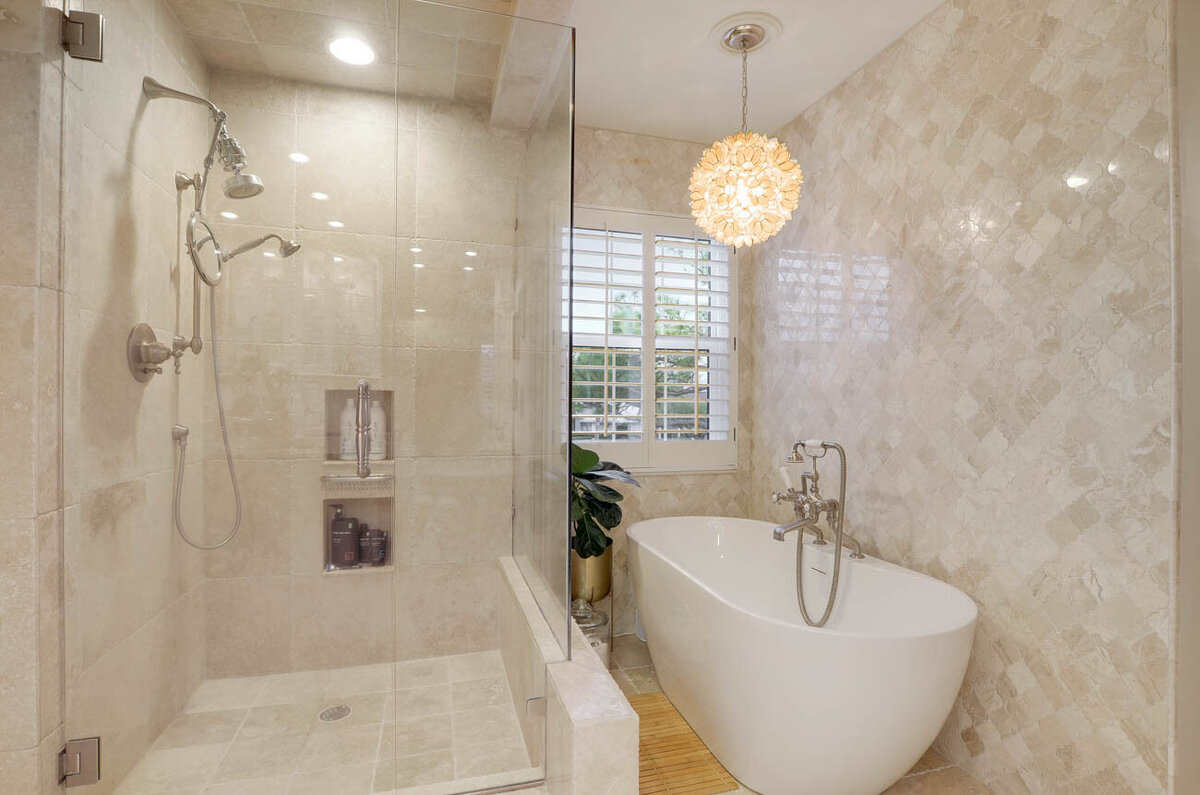 bathroom design with shower and tub