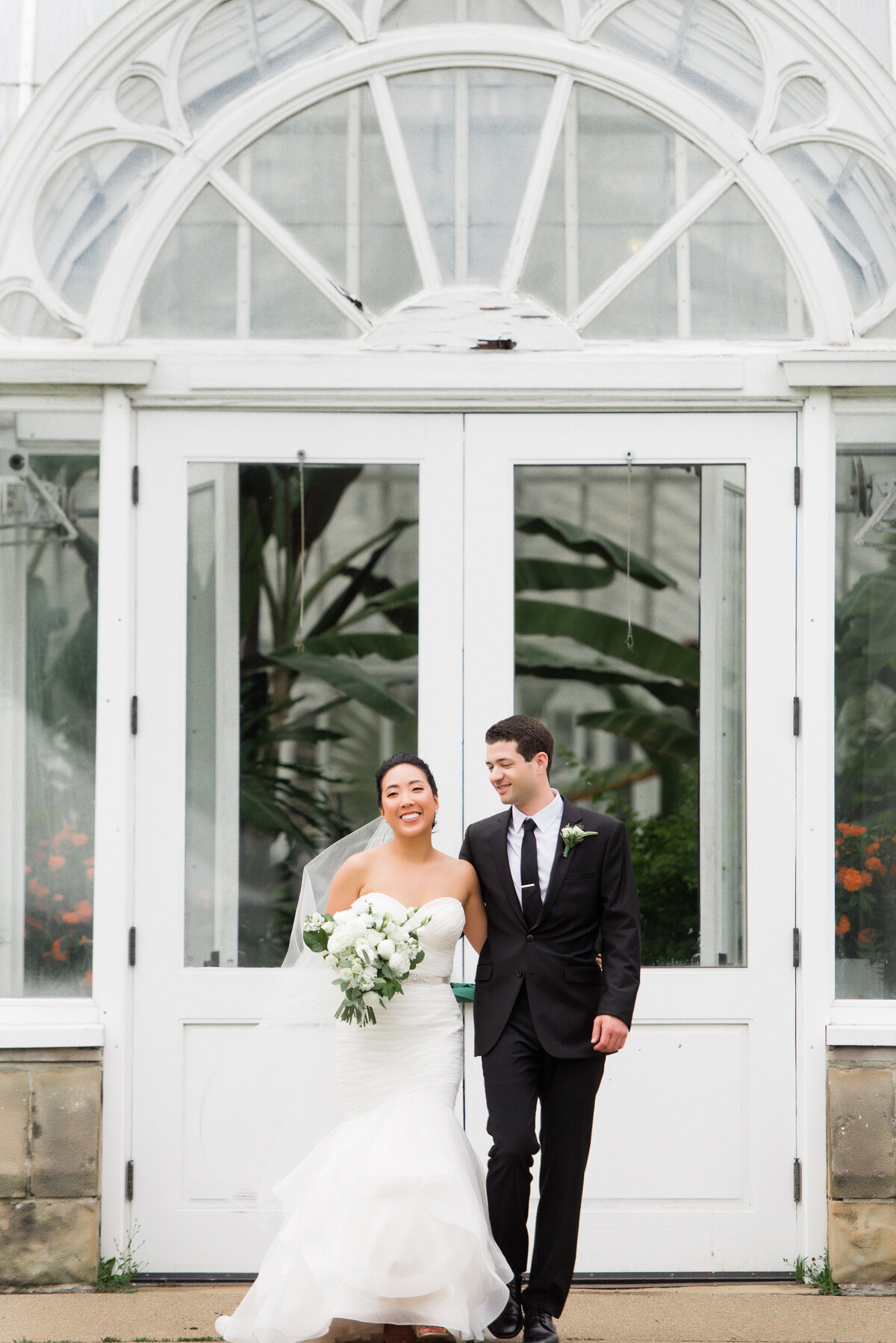 wedding picture in front of phipps conservatory