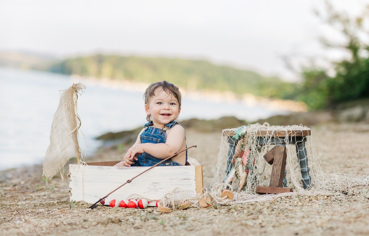 First birthday session at the Lake in Hanover PA  in a boat, little boys first birthday 