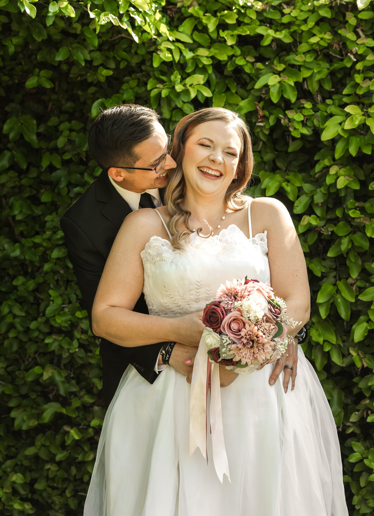 Bride-and-Groom-Laughing-at-The-Bibb-Mill
