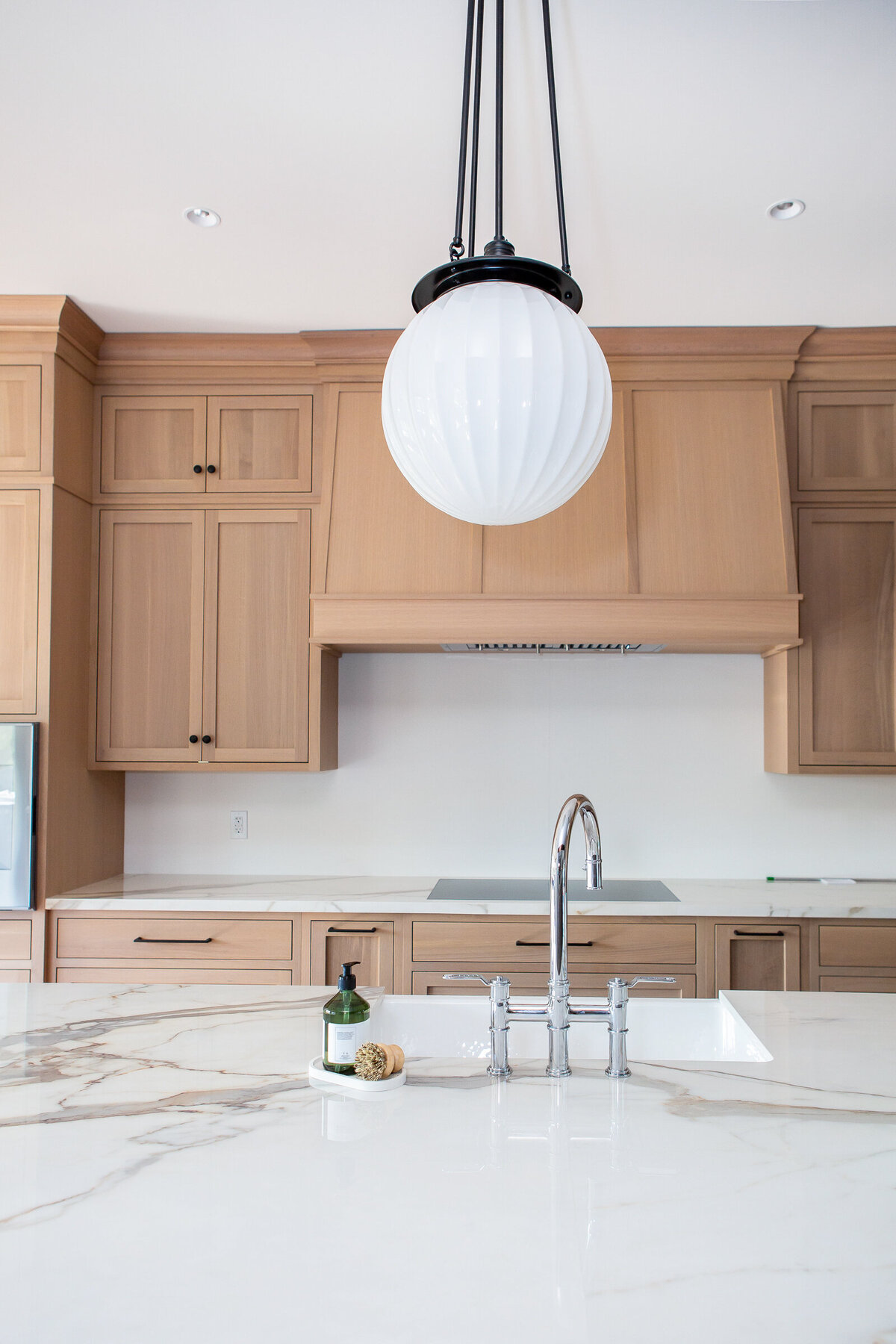 faucet adn sink in newly built custom kitchen