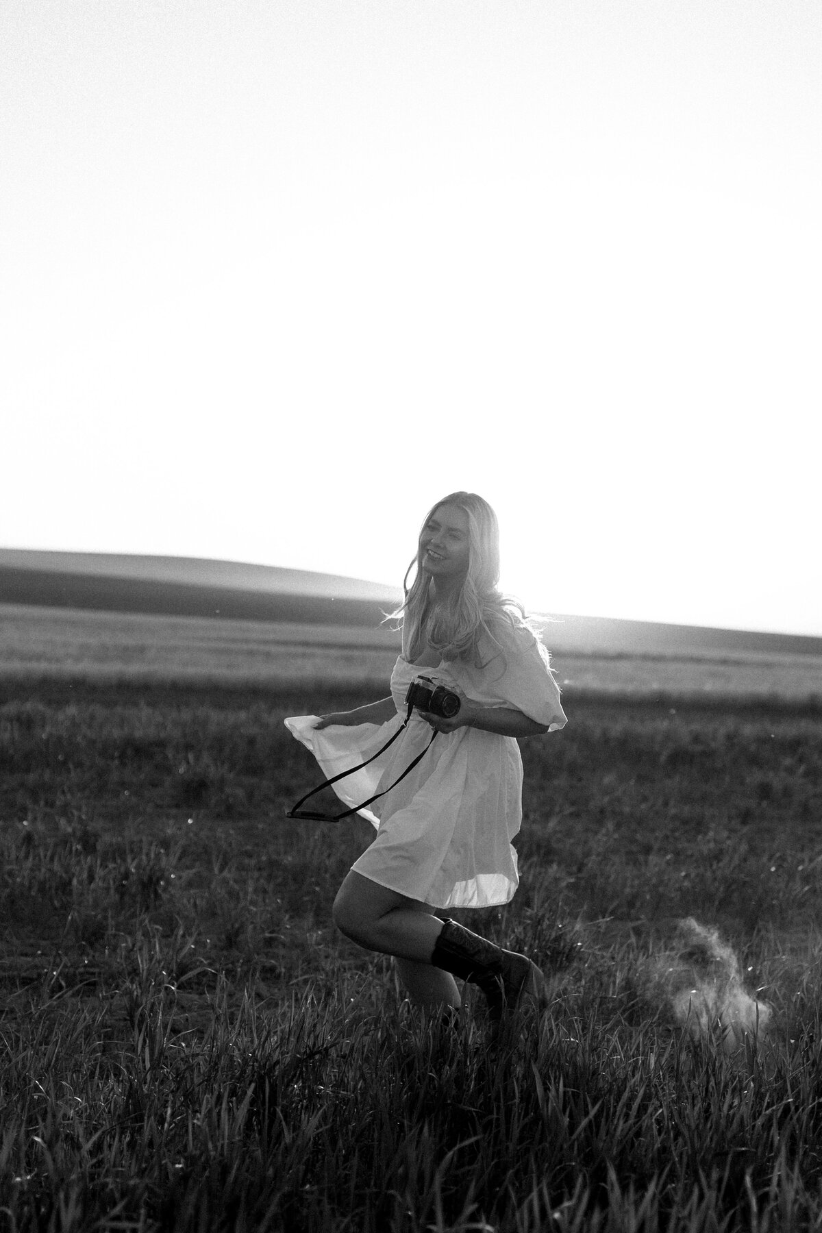 Black and white photo of wedding photographer.