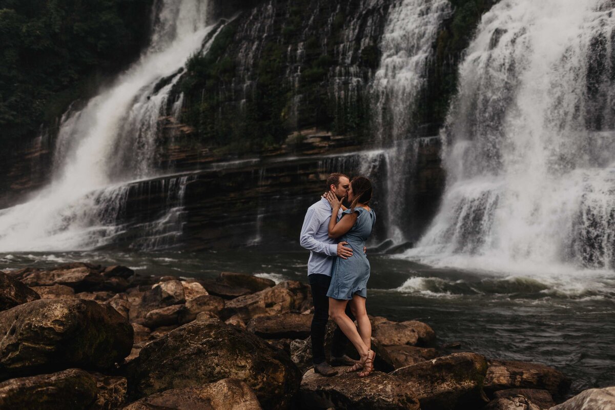 Adventure engagement session at Rock Island State Park waterfall in Tennessee photographed by Magnolia and Ember.