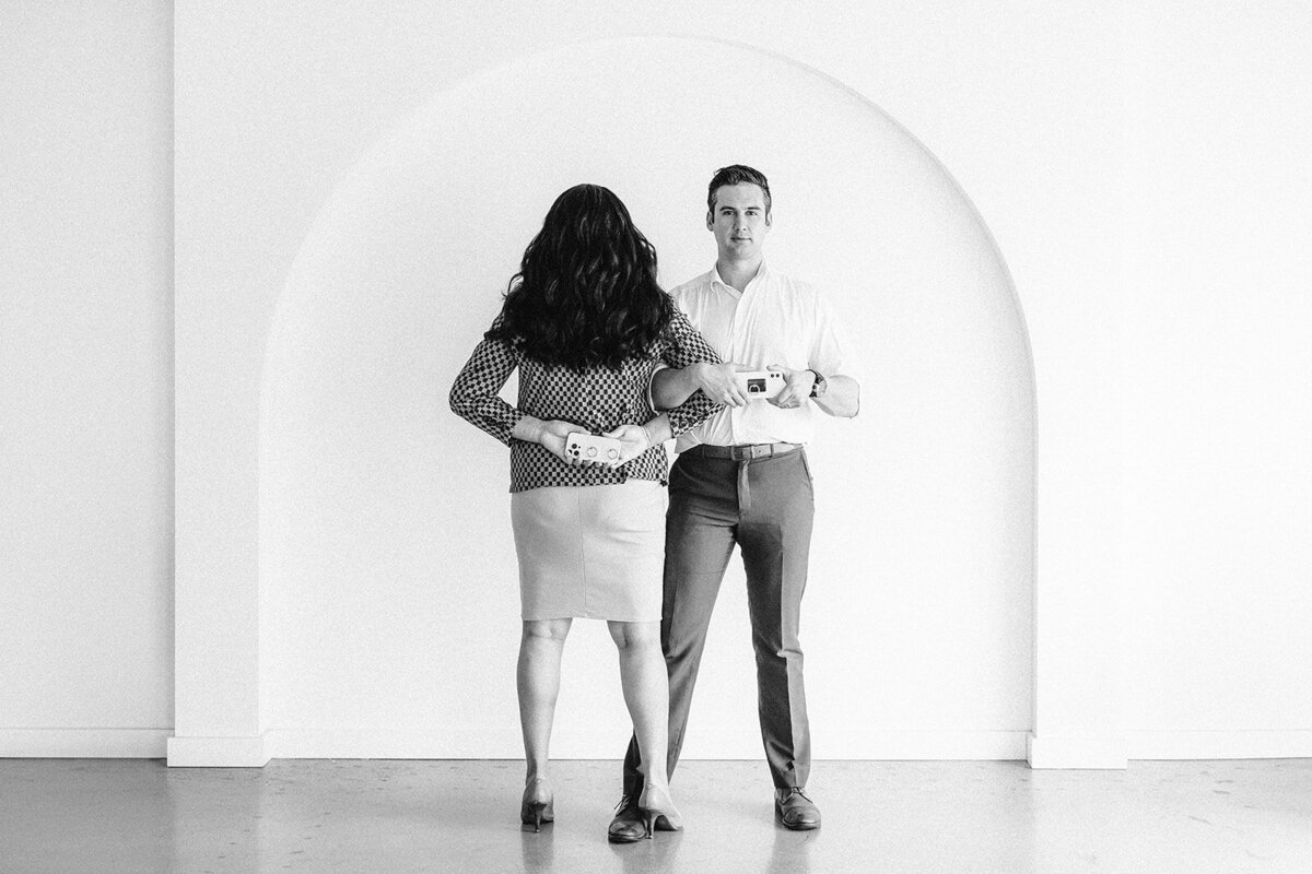 Two people look in opposite directions