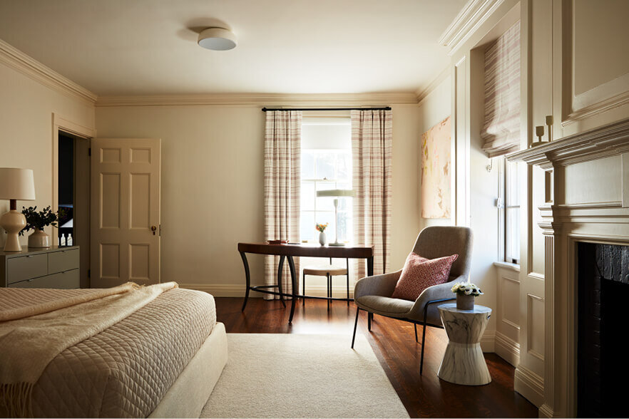 Historic home design for a bedroom in a traditional home with vintage furniture and timeless interiors, created by an interior designer in Boston.