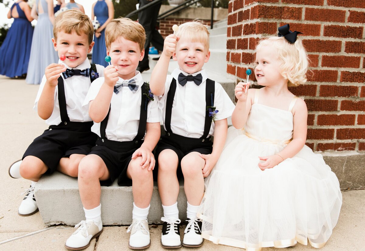 flower girl and ring bearer during wedding photos