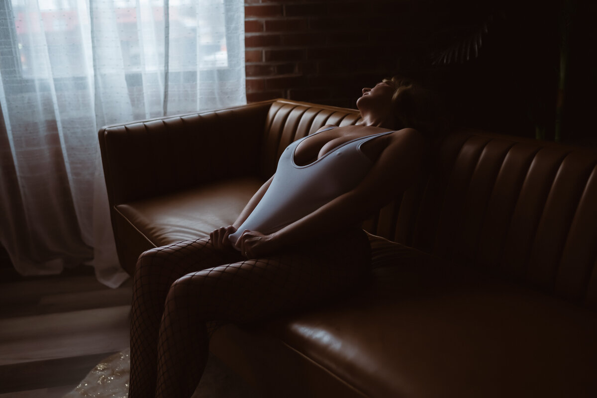 boudoir on couch in white tank top