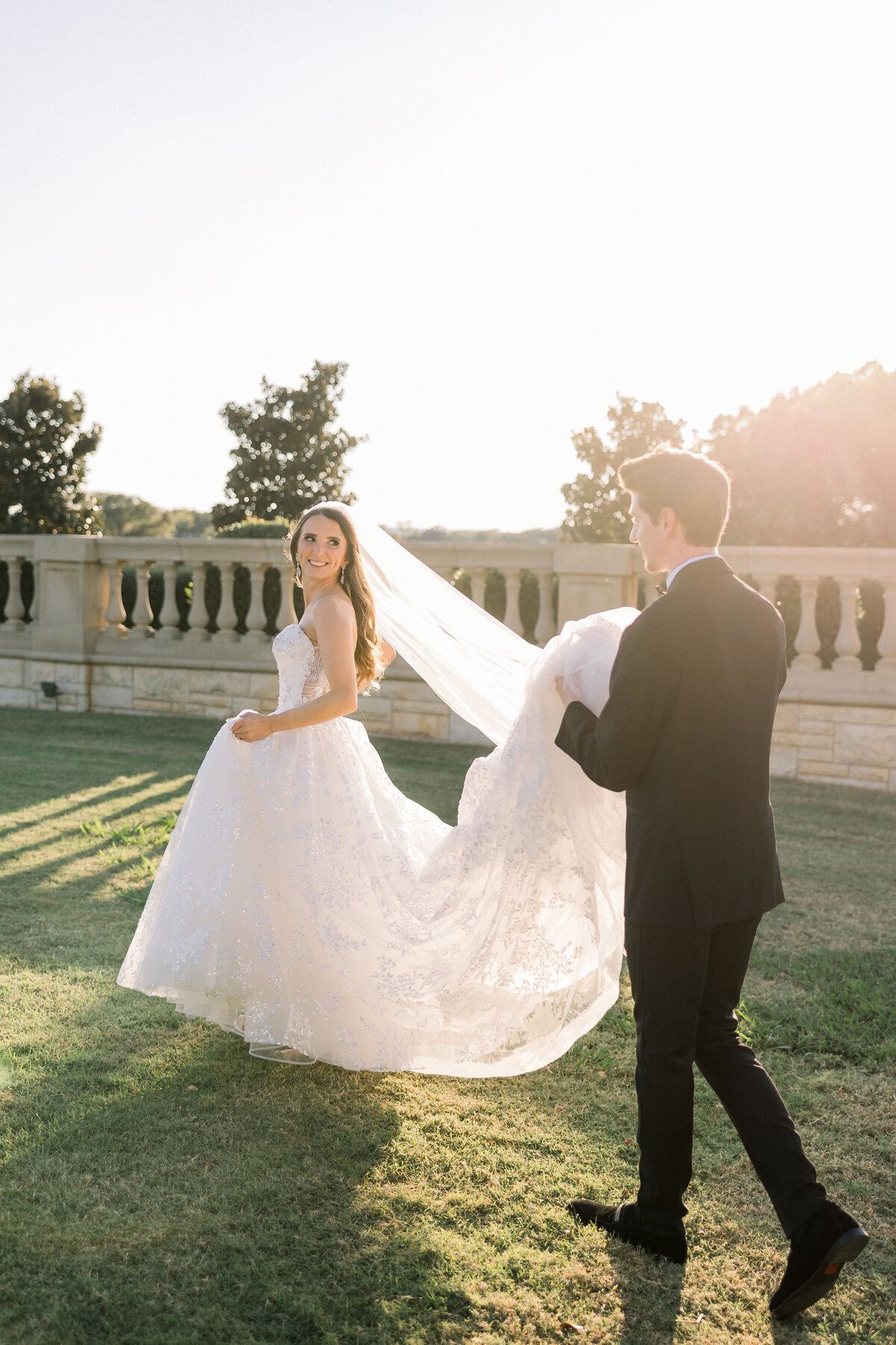 radiant-bridal-moment-with-sunlit-gown