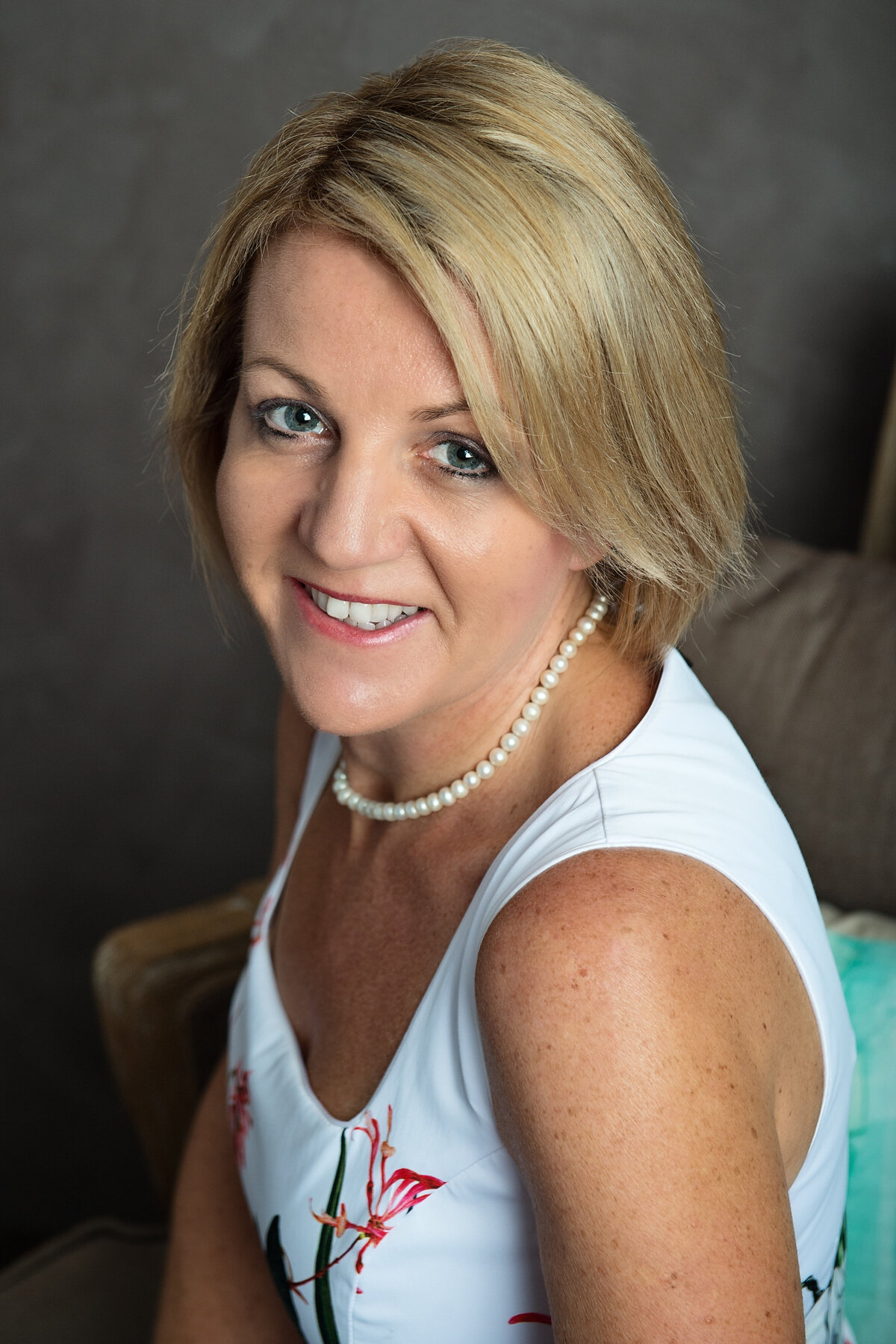 SQP-Teresa - floral dress seated close up-258